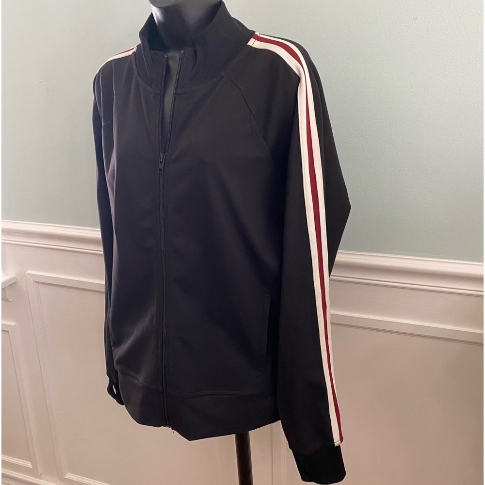 Sports jacket with side pocket, inside pockets for cell phone and thumb holes.